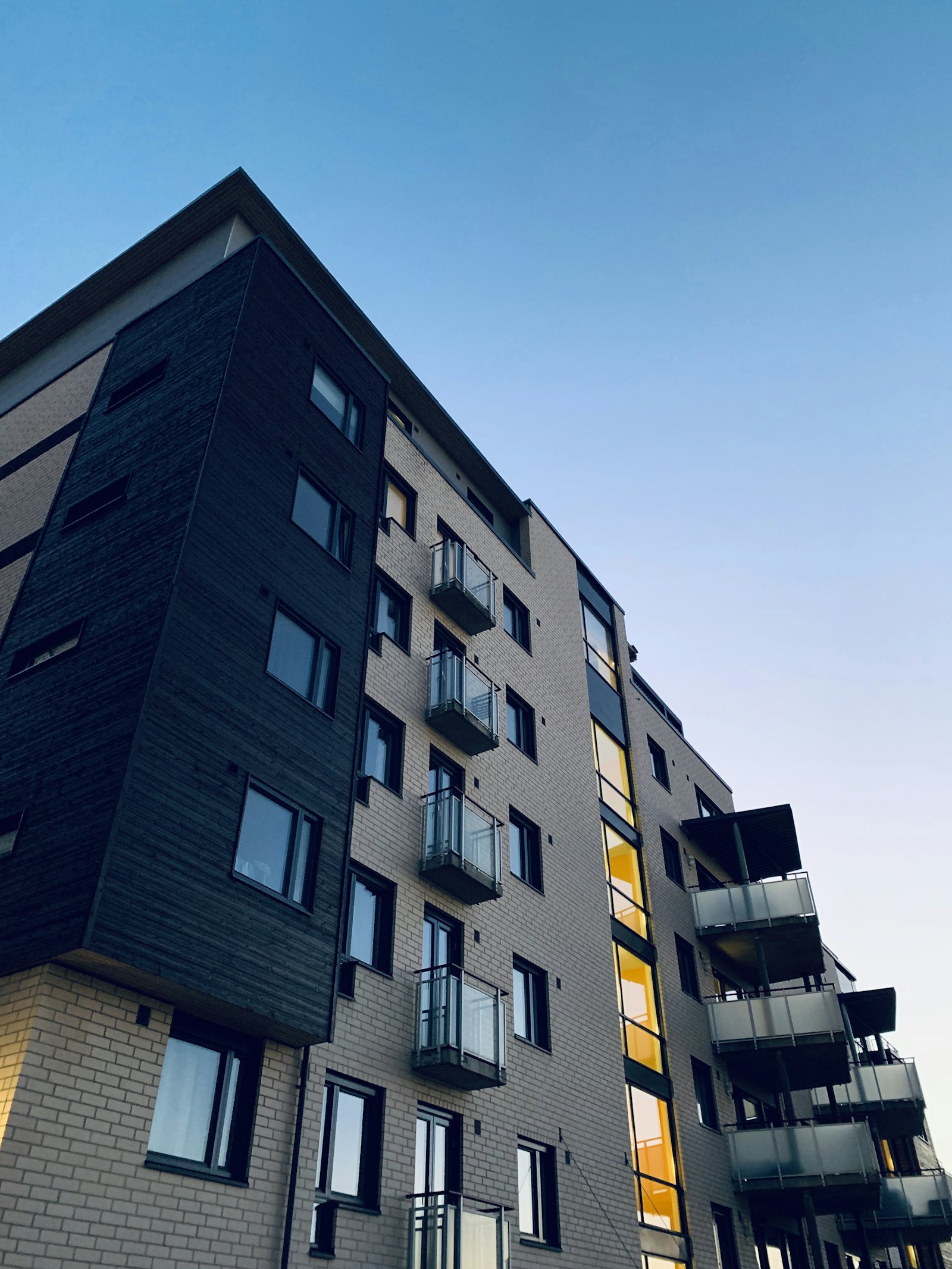 Coastal condominium tower at golden hour, Gulf-side